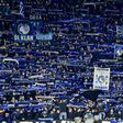 Atalanta fans cheer during the UEFA Champions League football match between against Valencia in Milan's San Siro Stadium on February 19