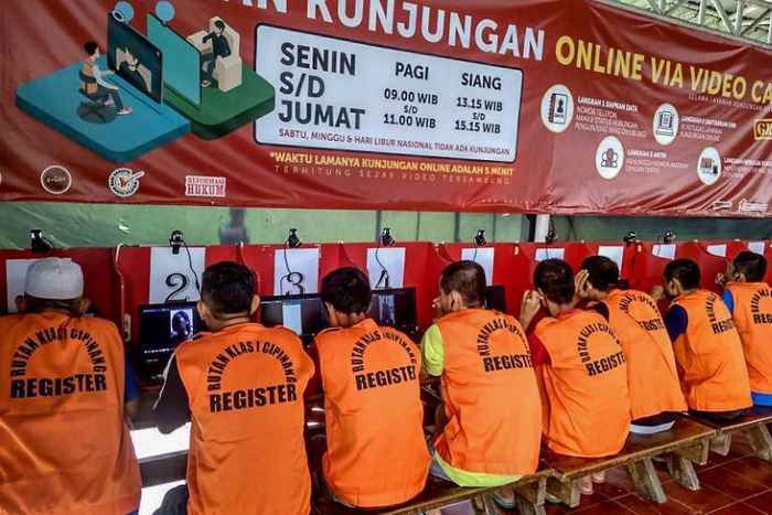 Indonesian inmates at a Jakarta prison talk via video to family members after visits were stopped because of coronavirus fears. Authorities have now gone further, and are releasing tens of thousands of prisoners in a bid to stop the spread of the virus...