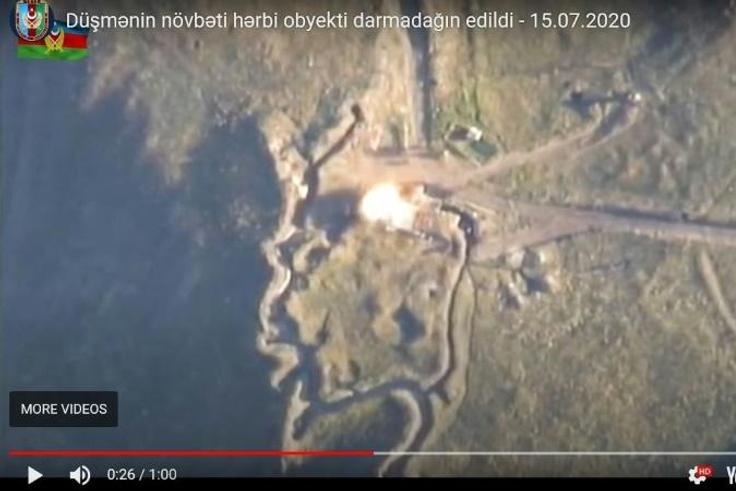 An image grab taken from a video uploaded on YouTube by the Azerbaijani Defence Ministry on July 15, 2020, allegedly shows an explosion targeting an Armenian army strong point on the Azerbaijani-Armenian border