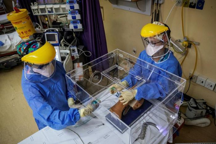 The 'intubox' creates a protective space around a sedated and intubated patient