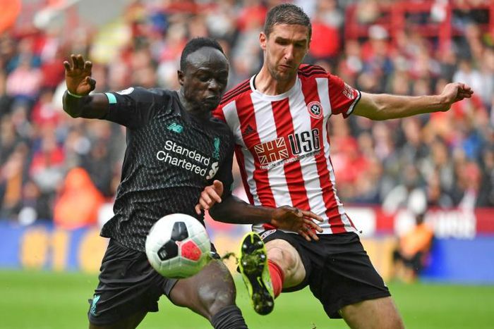 Sheffield United defender Chris Basham (R)