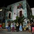 Neighbours applaud doctors and nurses who are battling the virus in Havana on March 30, 2020. Cuba is having trouble securing the medical supplies it needs to fight the pandemic