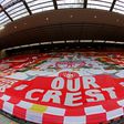 The Kop end at Anfield will host Liverpool's Premier League trophy presentation next week