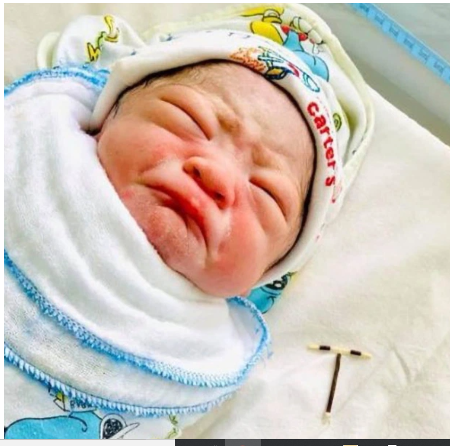 Baby comes out of mother’s womb holding failed family planning device firmly in his hand (photos)