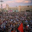 Thousands rallied in central Minsk waving the red-and-white flags of the opposition and calling on Lukashenko to step down
