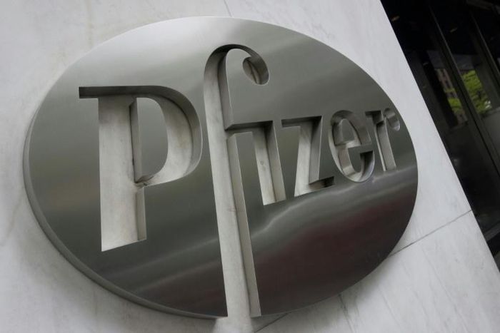 The Pfizer company logo is seen in front of Pfizer's headquarters in New York