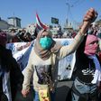 Iraqi students during an anti-government demonstration in Baghdad's Tahrir square in February, a month before the spread of coronavirus escalated into a major global crisis