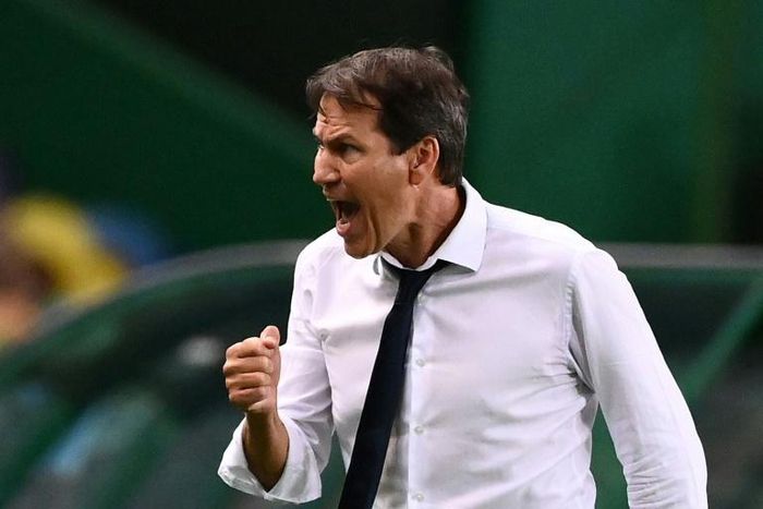 Lyon coach Rudi Garcia celebrates after his team's stunning win over Manchester City