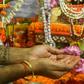 A fan with a tattoo of Amitabh Bachchan on his arm takes part in a ceremony praying for the Bollywood star's recovery from coronavirus in Kolkata