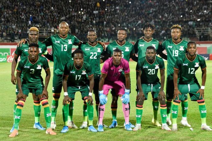 The Zambian national team pose before a 2022 Africa Cup of Nations qualifier in Algeria