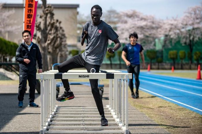 South Sudan Paralympic sprinter Michael Machiek Ting Kutjang trains at the team's Maebashi base, north of Tokyo. "We are eager to give them our continued support," says Shinichi Hagiwara, a sports official at the Maebashi city government