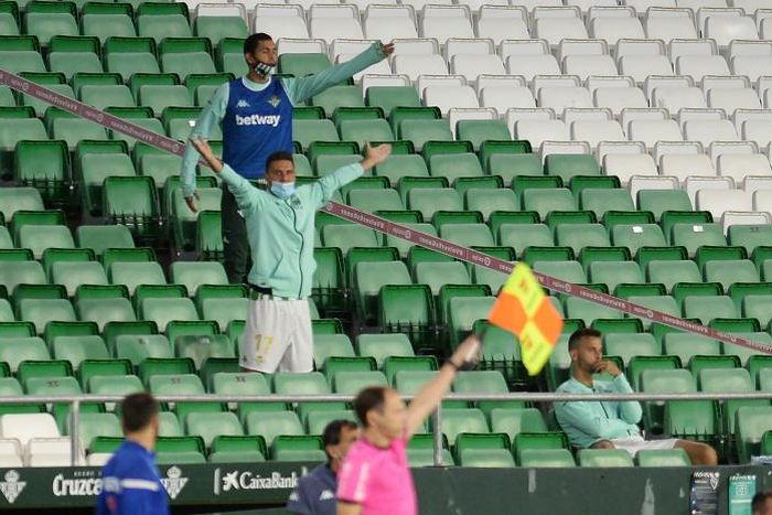Empty feeling: Real Betis' Spanish midfielder Joaquin (centre) gestures from the stands