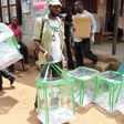 Electoral officers carrying ballot boxes (image used for illustrative purpose) [PRI]