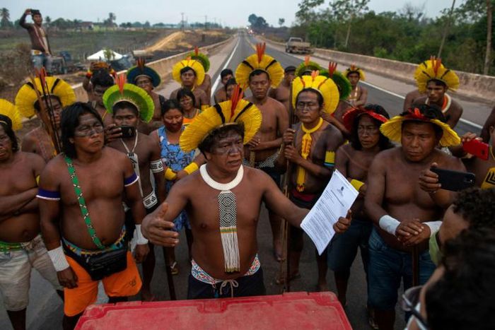 Members of the Kayapo indigenous tribe are blocking a highway through the Brazilian Amazon demanding help against the new coronavirus and an end to illegal mining and deforestation