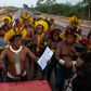 Members of the Kayapo indigenous tribe are blocking a highway through the Brazilian Amazon demanding help against the new coronavirus and an end to illegal mining and deforestation