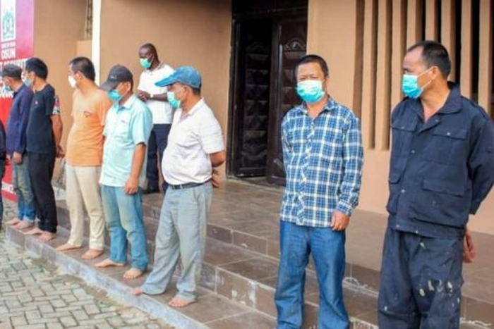 Arrested Chinese nationals (TheCable)