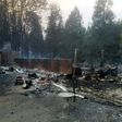 A burned out house is seen after the passing of the Holiday Farm fire in McKenzie Bridge, Oregon