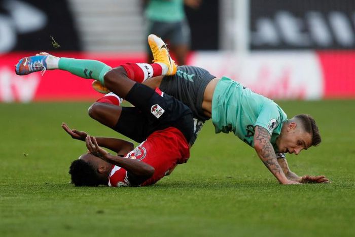 Everton defender Lucas Digne (right) fouls Southampton's Kyle Walker-Peters
