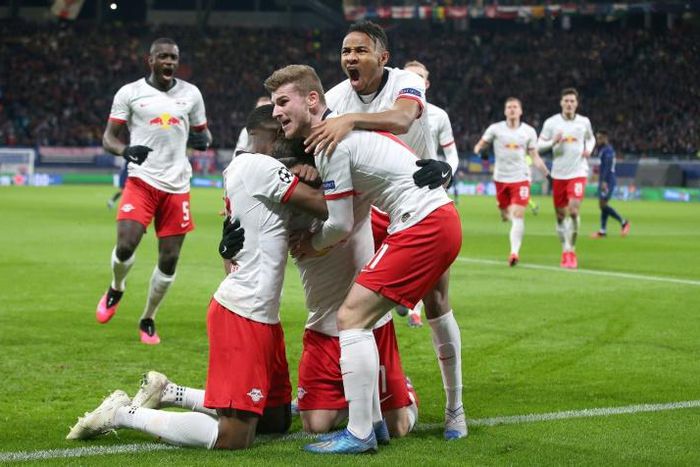 RB Leipzig, seen here celebrating a goal against Tottenham, are working on modified goal celebrations -- to avoid contact -- when the Bundesliga resumes Saturday.
