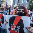 Around two thousand people marched in Warsaw on Friday to protest the government's withdrawal plan