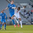 Air force: England's Mason Greenwood and Iceland's Jon Bodvarsson challenge for the ball