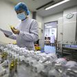 In this Sunday, Feb. 16, 2020, photo, a nurse prepares medicines for patients at Jinyintan Hospital designated for new coronavirus infected patients, in Wuhan in central China's Hubei province. China reported thousands new virus cases and more deaths i...