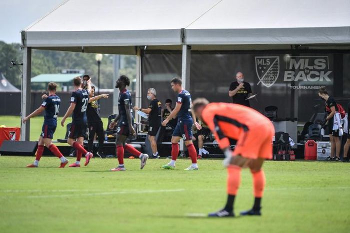 Chicago Fire's players celebrate Mauricio Pineda's winner in a 2-1 victory over Seattle Sounders at the MLS is Back tournament