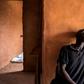 Blues: A young homeless man sings in a quarantined area at a refuge for newly-arrived street children outside Dakar