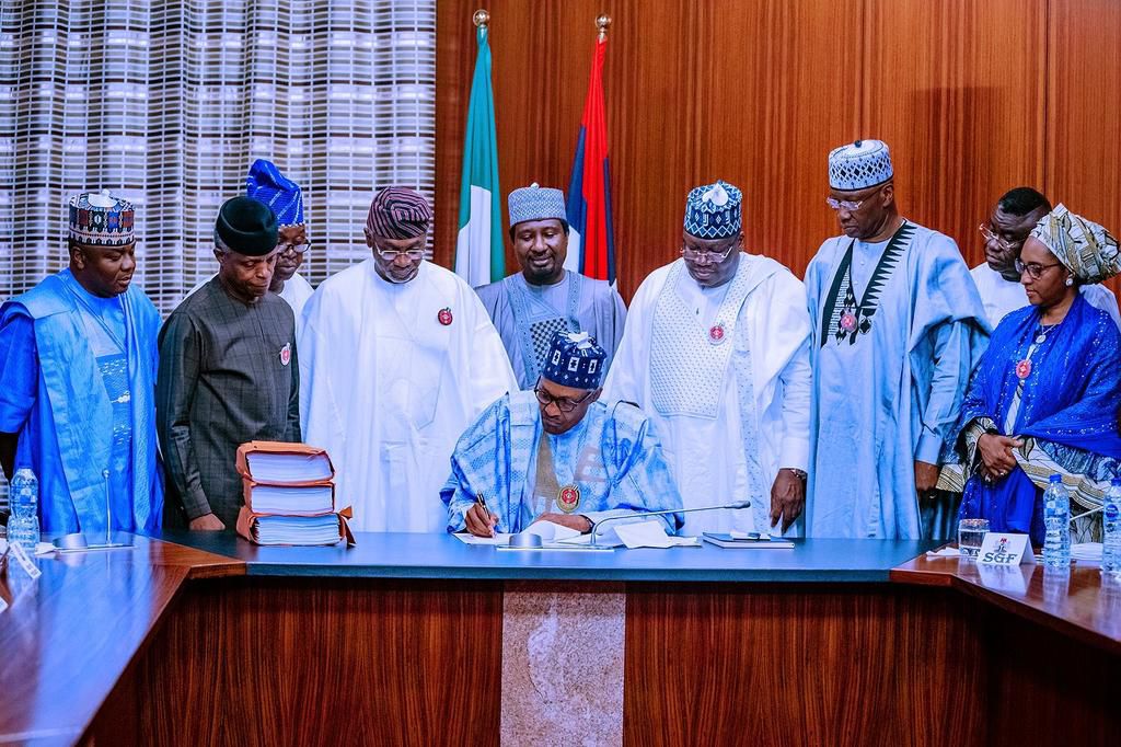 Photos of the 2020 Budget signing by President Buhari (Twitter @BashirAhmaad)