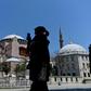 A woman takes a picture at the Hagia Sophia in Istanbul on July 2, 2020