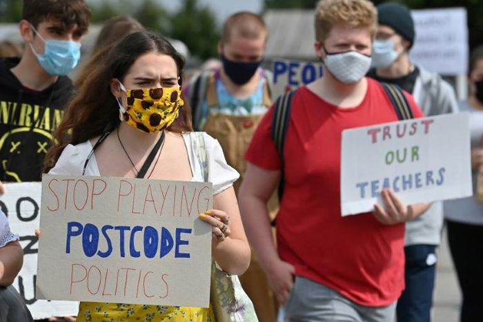 Students are holding protest marches and are threatening legal action, arguing that the system to determine final grades has penalised bright students from disadvantaged backgrounds