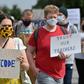 Students are holding protest marches and are threatening legal action, arguing that the system to determine final grades has penalised bright students from disadvantaged backgrounds