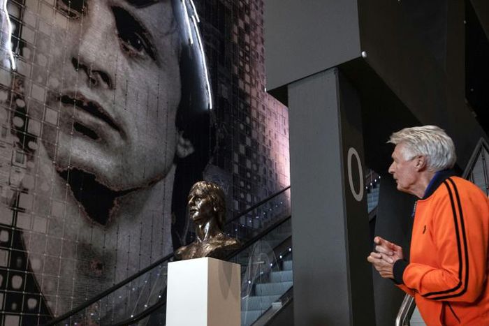 Wim Suurbier looks at a sculpture of former teammate Johan Cruyff at the Johan Cruyff ArenA in Amsterdam in January 2019