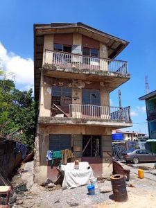 A picture of the two storey building located at Olaosun close, by Abati Barracks, off Western Avenue, before demolition.. [NAN]