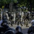 Law enforcement force peaceful protestors out in preparation for President Donald Trump and top advisors to take pictures at a church near the White House on June 1