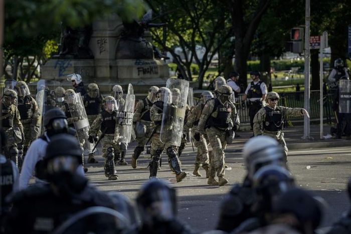 Law enforcement force peaceful protestors out in preparation for President Donald Trump and top advisors to take pictures at a church near the White House on June 1