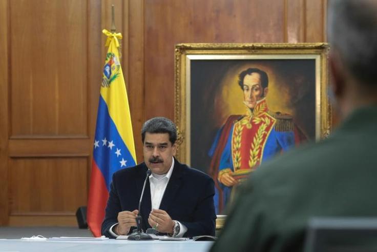 Venezuela's President Nicolas Maduro meeting with members of the military in Caracas on May 4, 2020 after an alleged "invasion" by  mercenaries