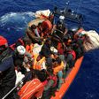 Some of the 51 migrants rescued in the first of the Ocean Viking's two operations in the Mediterrean on Thursday