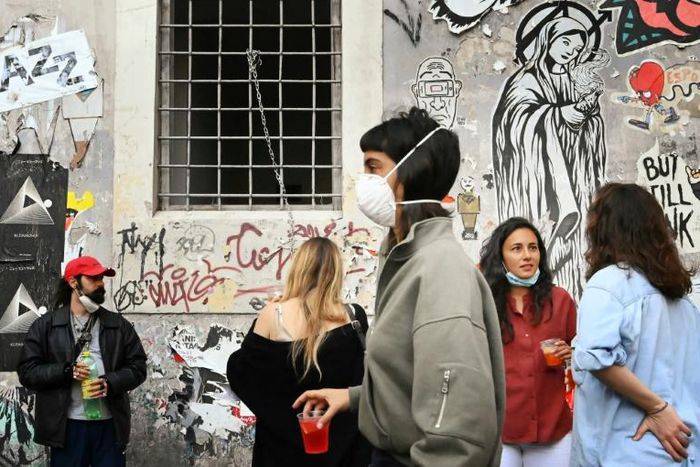 From Palermo to Turin, images of partygoers gathering in piazzas and outside bars have caused panic among officials