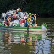 Rafters race down the Tisza River in northeastern Hungary collecting as much rubbish as possible