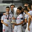 Dedication: Sevilla's Jesus Navas  holds the trophy