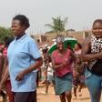 Young girls running to Narayi primary school to collect their share of foodstuffs being distributed to vulnerable people by the Kaduna State Government. [NAN]