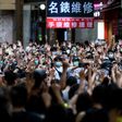 Protesters chant slogans  during a rally against a new national security law in Hong Kong on the anniversary of the city's handover from Britain