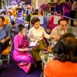 At the headquarters of Thai Airways in Bangkok, diners appear even to have missed plane food as they gobble up spaghetti carbonara served on plastic trays by cabin crew