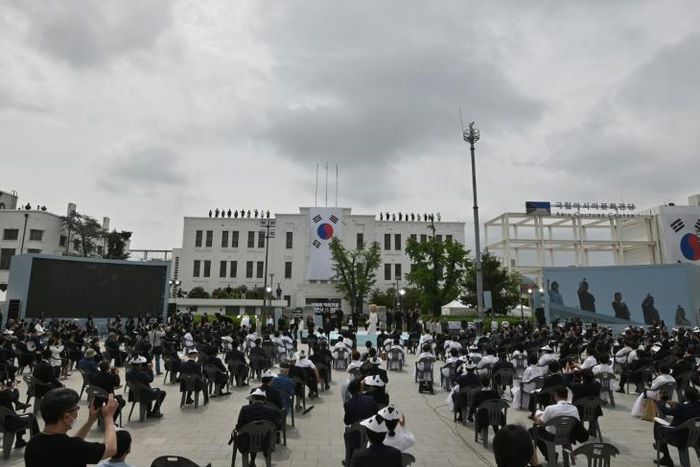 South Koreans attend a ceremony marking the 40th anniversary of the pro-democracy Gwangju Uprising