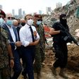 French President Emmanuel Macron visits the devastated site of the explosion at the port of Beirut on August 6