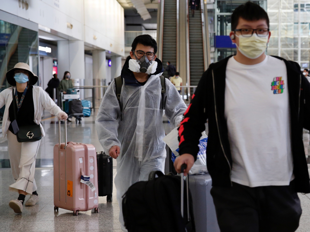hong kong airport coronavirus protective hazmat suit