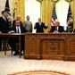 US President Donald Trump (C), Kosovar Prime Minister Avdullah Hoti (R) and Serbian President Aleksandar Vucic (L) listen to US Vice President Mike Pence during a signing ceremony, in the Oval Office of the White House in Washington, DC, on September 4...