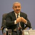 Palestinian Prime Minister Mohammed Shtayyeh addresses journalists during a press conference in the West Bank city of Ramallah