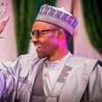 President Muhammdu Buhari congratulates Dapo Olorunyomi (Pulse)